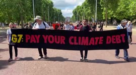 Climate activists march in London demanding G7 cancels debt for the Global South