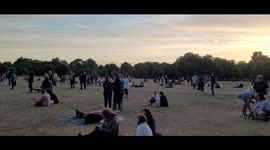 The public congregate outside BTS Hyde park Festival, enjoying the music for free.