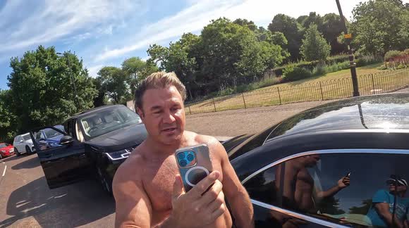 Cycling vigilante confronted by topless driver after catching motorists using phones