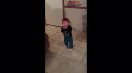 Girl Blows Into Animal Caller