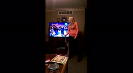 Woman Dances the Carlton With Dog