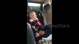 Boy Spits Up in Car