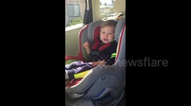 Tot Boy Screams in Car Seat