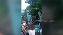 Terrified residents see 22ft crocodile tied to a truck... that turns out to be animatronic prop for TV show