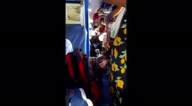Two girls singing a bhojpuri song in train
