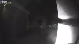 A slow flying non-identified abject activate my door bell and fly thru the wall into my garage and vanish.