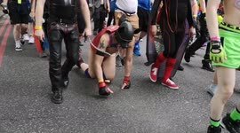 London Pride participants wear dog bondage hoods