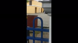 Prayer in front of the car in the courtyard of the monastery
