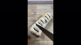 Sausage roll snack with cheese and beans