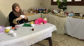 A woman in the Gaza Strip makes statues and handicrafts on the occasion of Eid Al-Adha.