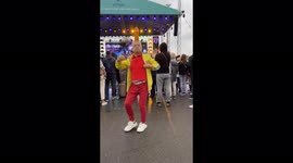 Eccentric Belarusian man dances with beer bottle on head