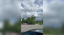 Teen couple arrive in style at school prom - via a HELICOPTER