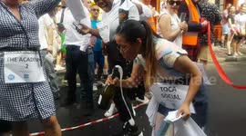 Thrills - and plenty of spills - as waiters in London’s Soho take part in annual champagne race