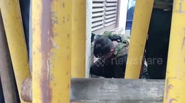 Protestors break barriers to storm inside presidential palace in western Sri Lanka amidst severe economic crisis