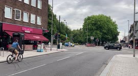 Cyclist rides on pavement to jump red light in Southampton Town Centre.