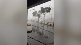 Violent storm rips through Philippines capital Manila forcing motorists to take shelter