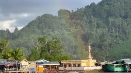 Rainbow starts from a mosque in Banguingui, Sulu