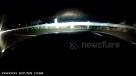 Motorist sent spinning after running over tyre on highway in California