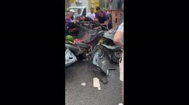 Rescue of a living driver from a passenger car and after a collision with a truck with watermelons