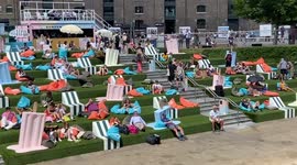 Sunbathers and giant ice lollies as Londoners roast in heatwave