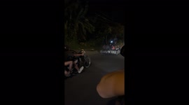 The guys ride on an unusual multi-wheeled transport in Bali!