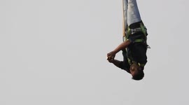 'World record' for solving Rubik's Cube while hanging upside down