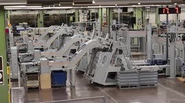 Saudis work inside a printing press to print the holy Koran, inside the King Fahd Glorious Qur'an Printing Complex