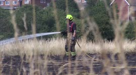 UK heatwave: Firefighters tackle large grass fire in Eastwood, Nottingham