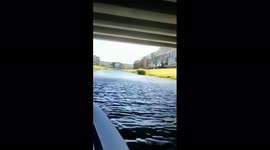 Terrifying moment Russian child leaps from bridge in front of boat