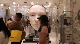 A Giant Robotic Head Now Greats Customers At Selfridge's In Central London. The Head Is Part Of A New Art Installation