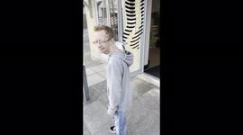 Cheeky RATS hitch ride on man’s shoulders during seaside stroll.