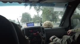 Ukrainian service members and humanitarian aid volunteers deliver food and medical packages to the villages North of Kharkiv