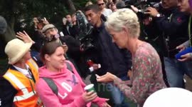Judy Murray hands out coffee to the Wimbledon queue