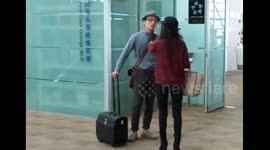 Woman accuses man of taking plane with phone 