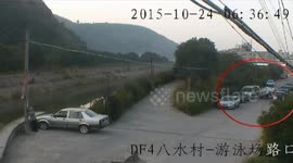 Driver lifts her car onto another