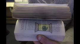 SHORT - Man creates 'Cujo' flip book in 'Cujo' book