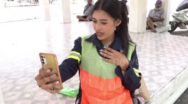 Glamorous Thai mum turns heads working as 'world's most beautiful street sweeper'