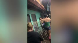 Partygoer pulls off window grill and hits own face in hilarious baton-twirling fail