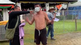 Locals chase slippery pigs lathered with oil during festival in Thailand