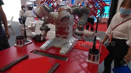 Robot Writes Calligraphy At The World Robot Conference 2021 in Beijing, China
