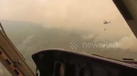 Army helicopters dump water on heatwave fire in Slovenia