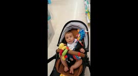 Babies funny first reaction to rain stick