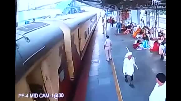 Caught on CCTV - RPF constable saves life of man dragged by train