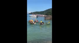 Visitors experience the spectacular basket boat dance on the sea in Vietnam