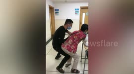 Chinese man uses his leg as chair so mother could sit down in hospital