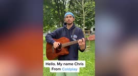 Ukrainian man performs at sold-out Coldplay gig after being approached by frontman Chris Martin while busking in Warsaw