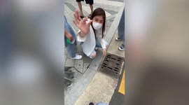 Tourists use chopsticks to retrieve AirPod that fell into drain in South Korea