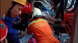 Harrowing Indonesia building collapse leaves one dead with two others rescued by emergency crews