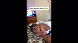 Toddler cries after mistakingly biting himself while playing with his mum