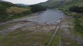 Amazing sunken village revealed at Haweswater Reservoir as Britain's driest July since 1911 continues to take its toll